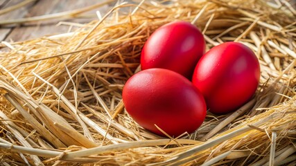 Fototapeta premium Bright red eggs nestled in natural straw, capturing the essence of springtime celebrations and seasonal traditions