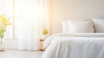 A serene white bedroom with sunlight streaming through large windows, offering a peaceful and airy ambiance.
