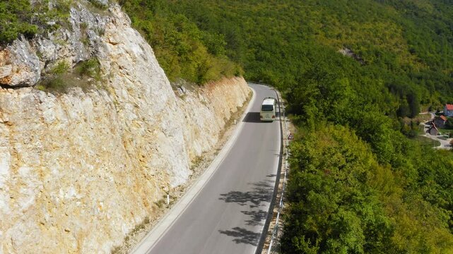 Coach / Bus on the road in Mountains, Bosnia and Herzegovina, Europe