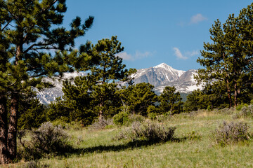 Snow covered peaks in early June in Rocky Mountain National Park, Colorado