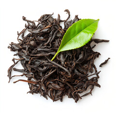 Obraz premium Black Tea Leaves with Green Leaves
