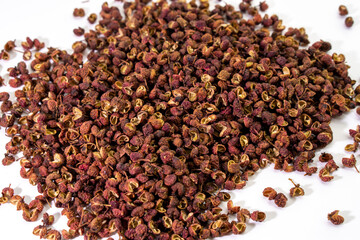 Close up of traditional Chinese spice. Sichuan peppercorns. Sichuan pepper often used in Chinese...