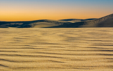 a wonderful sunset over the desert in silence and tranquility