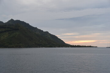 Naklejka premium The lush green mountains and rainforests of Moorea island in French Polynesia, South Pacific
