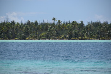 The white sand beaches and green backdrop on Bora Bora, French Polynesia