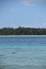 The white sand beaches and green backdrop on Bora Bora, French Polynesia