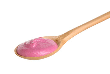Tasty beetroot hummus in wooden spoon isolated on white