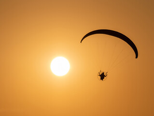 Paramotor with golden evening light