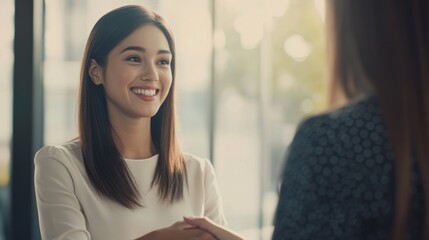 Smiling woman shaking hands