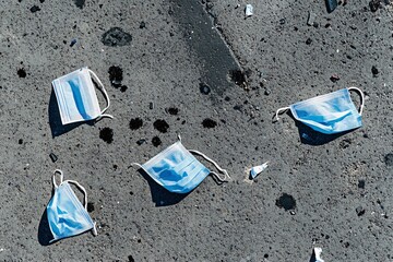 Discarded Face Masks Littering a Street: A Reminder of the Pandemic's Environmental Impact