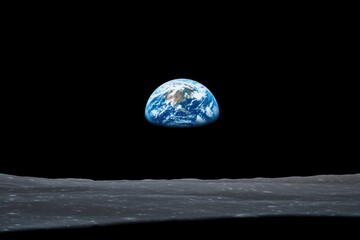 During a space mission, Earth is visible above the lunar horizon, exhibiting its vibrant colors against the stark blackness of space, highlighting the contrast between celestial bodies