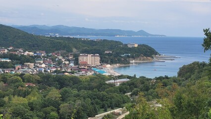 Obraz premium Sea, beach and pebbles, clouds in the sea.