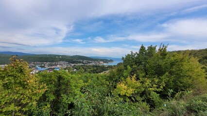 Obraz premium Sea, beach and pebbles, clouds in the sea.
