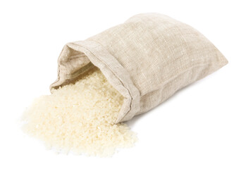 Raw rice and overturned burlap sack isolated on white