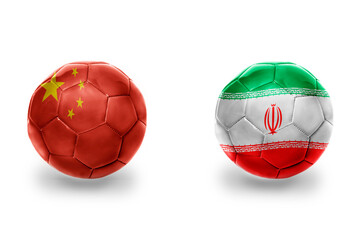 football balls with national flags of iran and china ,soccer teams. on the white background.
