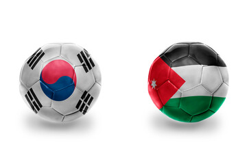 Obraz premium football balls with national flags of jordan and south korea ,soccer teams. on the white background.