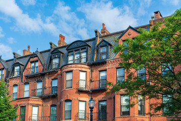 Fototapeta premium Historic Brick Building facade with Mansard roof and Elegant Dormers in Boston, Massachusetts, USA