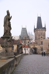 charles bridge at morning with fog, prague, praga, czech republic