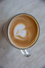 close up veiw on cuppucino in glass cup