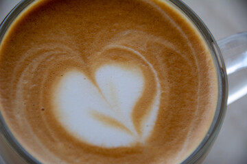 close up veiw on cuppucino in glass cup