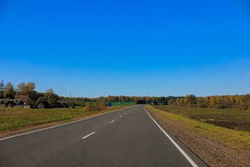 Autumn landscape, road and highway, asphalt and roadside.