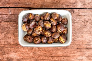 Fototapeta premium Traditional Portuguese Christmas roasted chestnuts