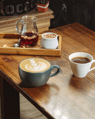 cup of tea and teapot on table