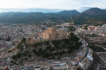 Aerial view of Caravaca De La Cruz cityscape and castle
