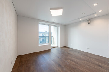 Empty Home Kitchen Interior. White Walls Room Corner and Windows. Interior Empty Room with White Walls and Wooden Floor.