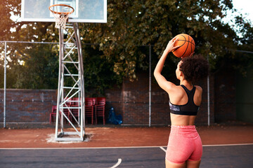 Girl, sports and ball on basketball court as athlete or player for challenge as ready for training....