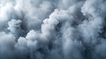 Fototapeta premium Dense Cloud of White Smoke or Fog Creating a Mysterious and Atmospheric Background in a Studio Setting