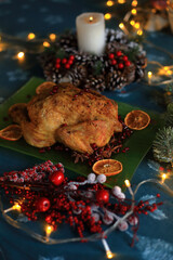 a beautifully roasted turkey, perfectly golden and glistening, presented on a festive holiday table for Christmas Eve