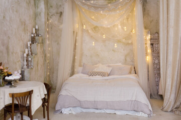 Christmas bedroom with baldachin and candles © aprilante