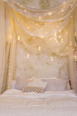 Christmas bedroom with baldachin and candles © aprilante