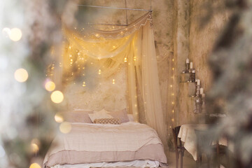 Christmas bedroom with baldachin and candles © aprilante