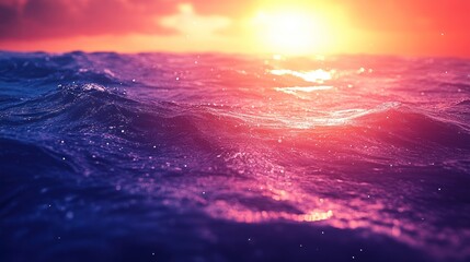 Fototapeta premium A vibrant sunset over a calm ocean with a beautiful pink and purple sky.