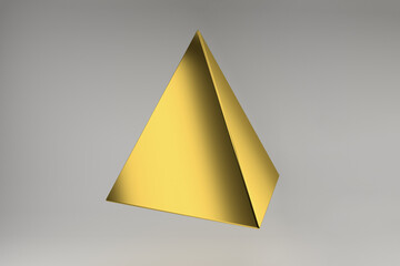 Golden pyramid on a gray background.Realistic 3d rendering of golden tetrahedron. Platonic solids.