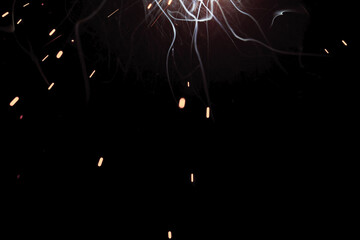 A bright flash of light and a sheaf of sparks in a cloud of smoke. Miniature Universe. Design...