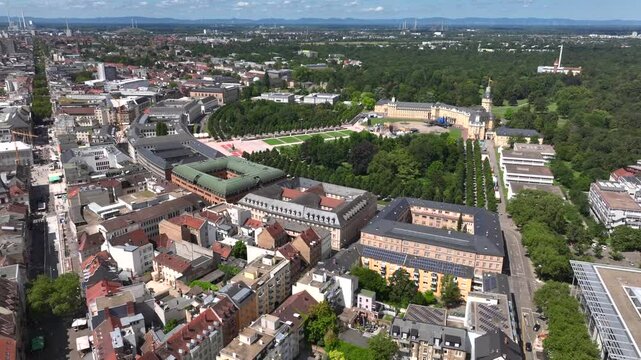 Drone aerial footage of Karlsruhe Palace in Germany, showing the palace's baroque architecture and tranquil surrounding.