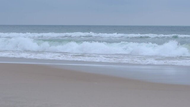 Rough sea at the Tombo beach of Guaruja - SP, Brazil. Beach of the coast of S&atilde;o Paulo state.