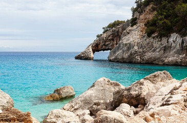 Awesome crystal clear Mediterranean sea at the eastern coast of Sardinia, Italy. Fabulous turquoise emerald water and gorgeous rocks. Cala Goloritze, Baunei area, Sardinia.