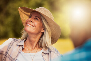 Mature woman, happy or hat in garden for relax, peace or positivity at Thanksgiving with friend....