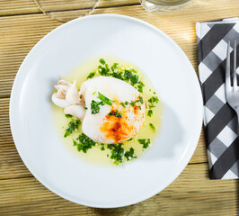Fried sepia served with green sauce from garlic and olive oil, served with parsley