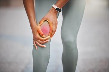 Knee pain, sports and woman with red glow in city for muscle sprain with running exercise. Fitness, injury and female athlete with nerve compression in leg for cardio workout or race training in town