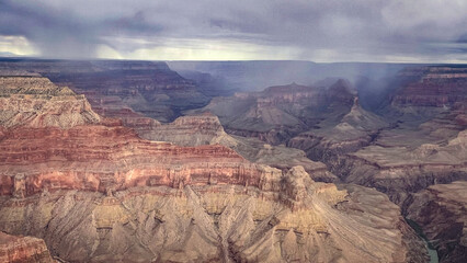 Aerial view of Grand Canyon with rain clouds