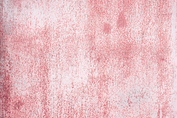 Fragment of a rusty grunge surface. Dark red background color. Scuffs and peeling of old paint....