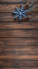 Fototapeta premium The aqua blue snowflake and silver star create a charming holiday decoration against a rustic wooden backdrop