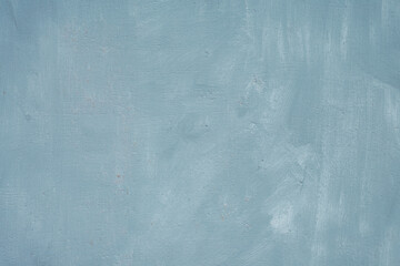 Fragment of a rusty grunge surface. Blue-brown background color. Scuffs and peeling of old paint....