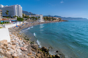 Fototapeta premium Nerja beach Playa de Torrecilla Costa del Sol Spain Andalusia blue mediterranean sea and waves