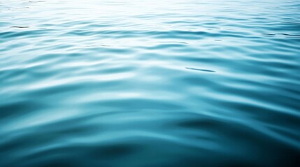 Naklejka premium Abstract Ripples on Calm Blue Water Surface